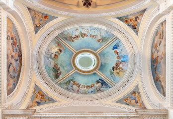 NAPLES, ITALY - APRIL 20, 2023: The fresco of angels as symbolic of paradise on the side cupola in the church  Basilica della Santissima Annunziata Maggiore. 
