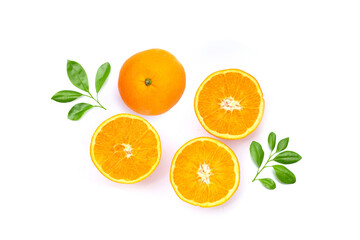 Orange fruit with green leaves on white background.