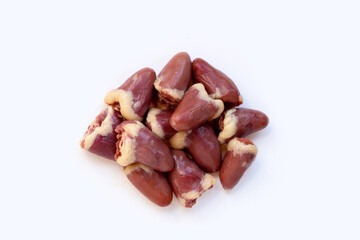 Raw chicken hearts on white background.