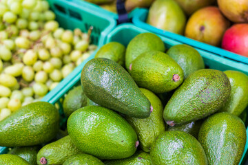 Abundance of Fresh Green Produce at Market. Avocado, Fruit, and Vegetable