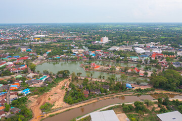 Aerial view of residential neighborhood roofs. Urban housing development from above. Top view. Real estate in Kalasin, Isan province city, Thailand. Property real estate.