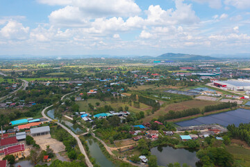 Naklejka premium Aerial top view of lush green trees from above in tropical forest in national park in summer season. Natural landscape. Pattern texture background.