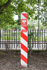 Polish border post with polish coat of arms.