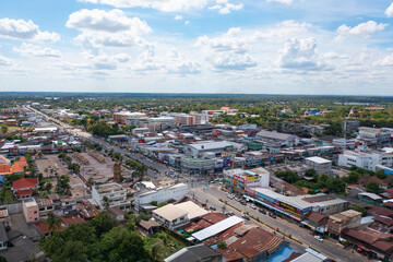 Aerial view of local residential neighborhood roofs. Urban housing development from above. Top view. Real estate in Isan urban city town, Thailand. Property real estate.
