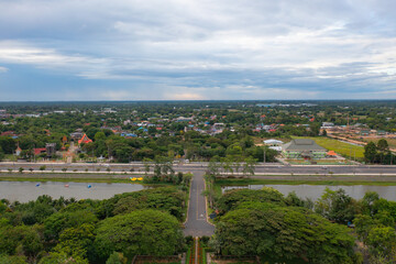 Aerial view of local residential neighborhood roofs. Urban housing development from above. Top view. Real estate in Isan urban city town, Thailand. Property real estate.
