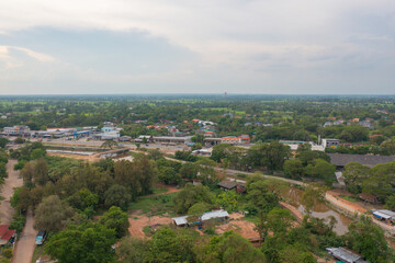 Aerial view of local residential neighborhood roofs. Urban housing development from above. Top view. Real estate in Isan urban city town, Thailand. Property real estate.