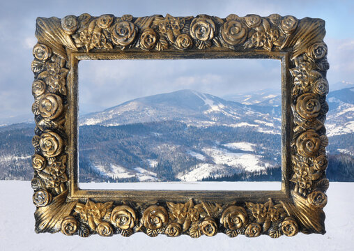Vintage frame and beautiful mountains covered with snow in winter