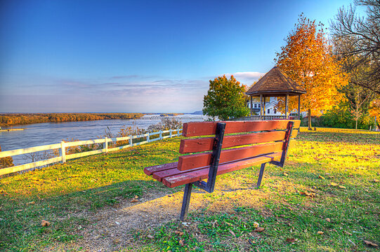 Bench on the Bluff.  An inviting bench tempts us to take a breather on a beautiful fall day on top the bluffs overlooking the Mississippi River at Riverview park in Louisiana Missouri.