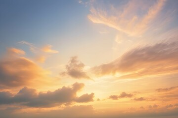 Fototapeta na wymiar オレンジ色の夕焼けの美しい空と雲。グラデーションする空の色