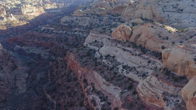 Flying through Calf Creek canyon at sunset, with beautiful rock layering