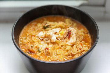 Ramen noodles, a culinary icon, simmering in cultural fusion. Chopsticks poised for gastronomic journey, uniting flavors and traditions