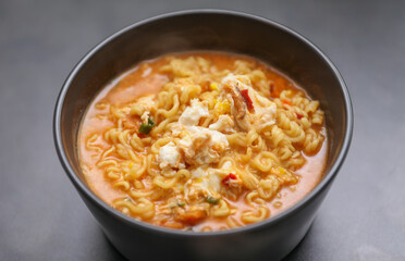 Ramen noodles, a culinary icon, simmering in cultural fusion. Chopsticks poised for gastronomic journey, uniting flavors and traditions