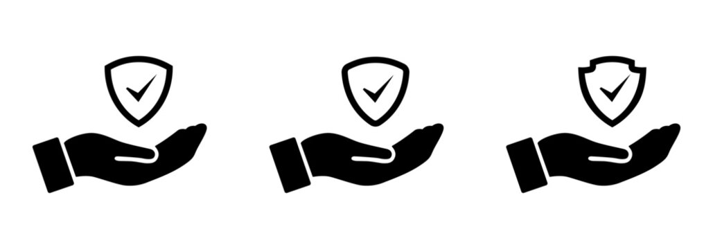 Security shield icon set on hand. Security shields logotypes with check mark, tick mark, right and yes mark. Security shield symbols on palm hand in black color outline. Vector illustration.