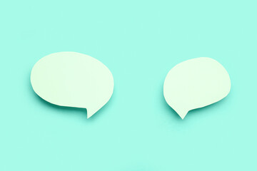 Blank speech bubbles on turquoise background
