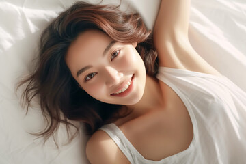 Obraz na płótnie Canvas Pretty Asian young lady lies on indoor bed. She keeps eyes open and looks satisfied with positive thinking and smiling to camera. Generative AI.