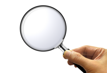 hand holding magnifying glass
