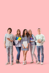 Group of students on pink background