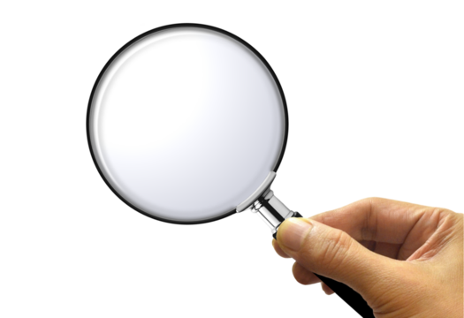 hand holding magnifying glass