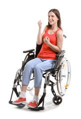 Fototapeta na wymiar Happy young woman in wheelchair on white background