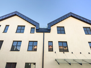 low angle view of old apartment building in downtown after renovation