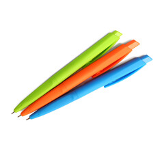 Colorful pens on white background