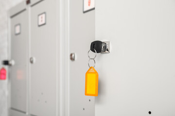Modern locker with key, closeup