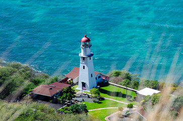 Fototapeta na wymiar lighthouse on the coast of the island shore