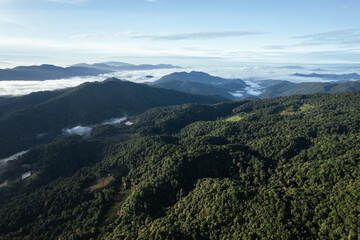Obraz premium Mountains in summer morning and fog
