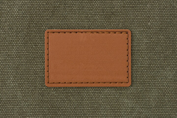Leather label on cloth - 638272529