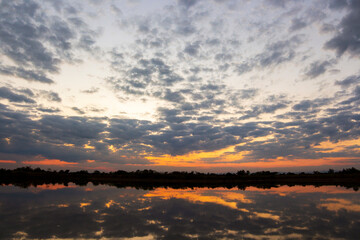 colorful dramatic sky with cloud at sunset