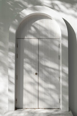 White arched door with softlight and shadow texture background, Arched exterior door background