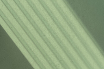 Green concrete wall abstract background with lines shadow