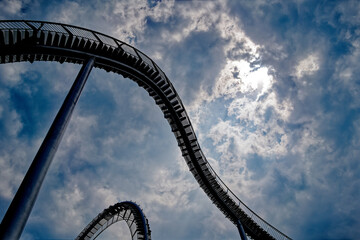 Cloudy skies and steel structures