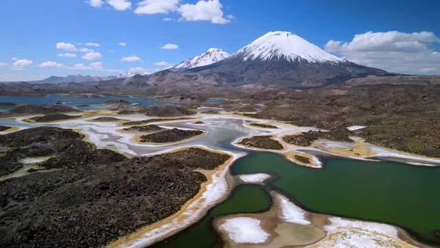 Aerial view over of Cotacotani Lagoon, Lauca National Park in Chile - dolly, drone shot