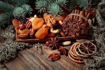 Christmas still-life with dried fruits and nuts.