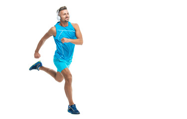 Fototapeta premium In morning sport workout jogger run in studio, advertisement. The jogger stretched legs before running. sport jogger listen to music in headphones. The jogger ran at sport training isolated on white