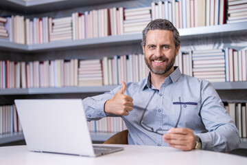 estudy concept. online webinar education for man. webinar tutorial online. man study online. education for man. remote webinar of man in workplace. video intrview on conference. Online courses