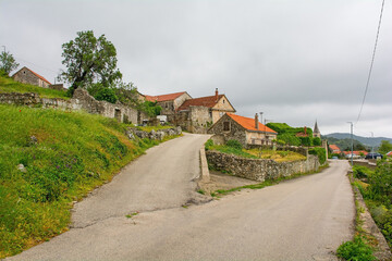 Fototapeta na wymiar Historic residential buildings in the town of Nerezisca on Brac Island in Croatia