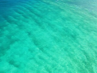 Tropical turquoise clear sea water surface, Top view blue sea