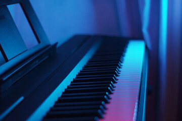 Neon colour synthesizer, home interior, elective focus, music concept