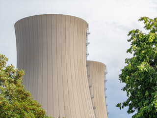 Green landscape and nuclear power plant .