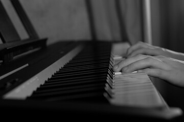 Fototapeta premium Close-up piano keyboard, black and white. music concept.