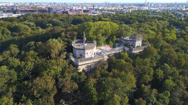 Nice aerial top view flight 
Flak tower Humboldthain Bunker World War 2, Berlin mitte summer 2023. panorama orbit drone
4k cinematic