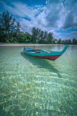 Traditional long tail boat in the sea, Bintan Island, Indonesia