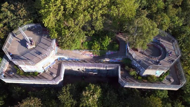 Smooth aerial top view flight 
Flak tower Humboldthain Bunker World War 2, Berlin mitte summer 2023. drone top down Above view
4k cinematic