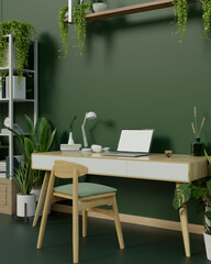 Interior design of a modern stylish green home office workspace with a laptop on a table