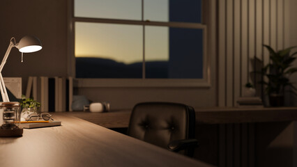 Copy space on a wooden table with a table lamp in a modern room in the evening.