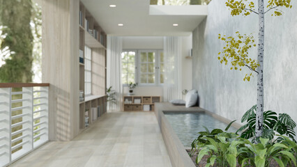 Modern minimal relaxation lounge or living space with indoor pond, a tree, plants