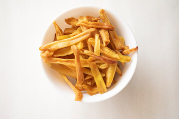 A bowl of crispy Jack fruit chips an Indian snack most famous in south India 