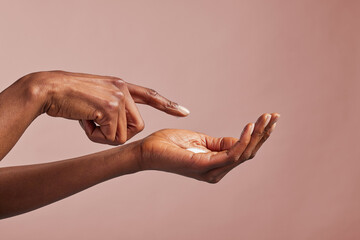 African american beauty hands with moisturizing cream on palm